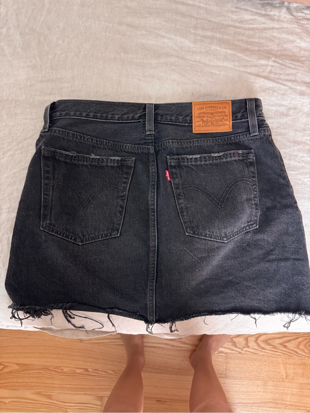 Levi's Black Washed Denim Mini Skirt with Frayed Hem